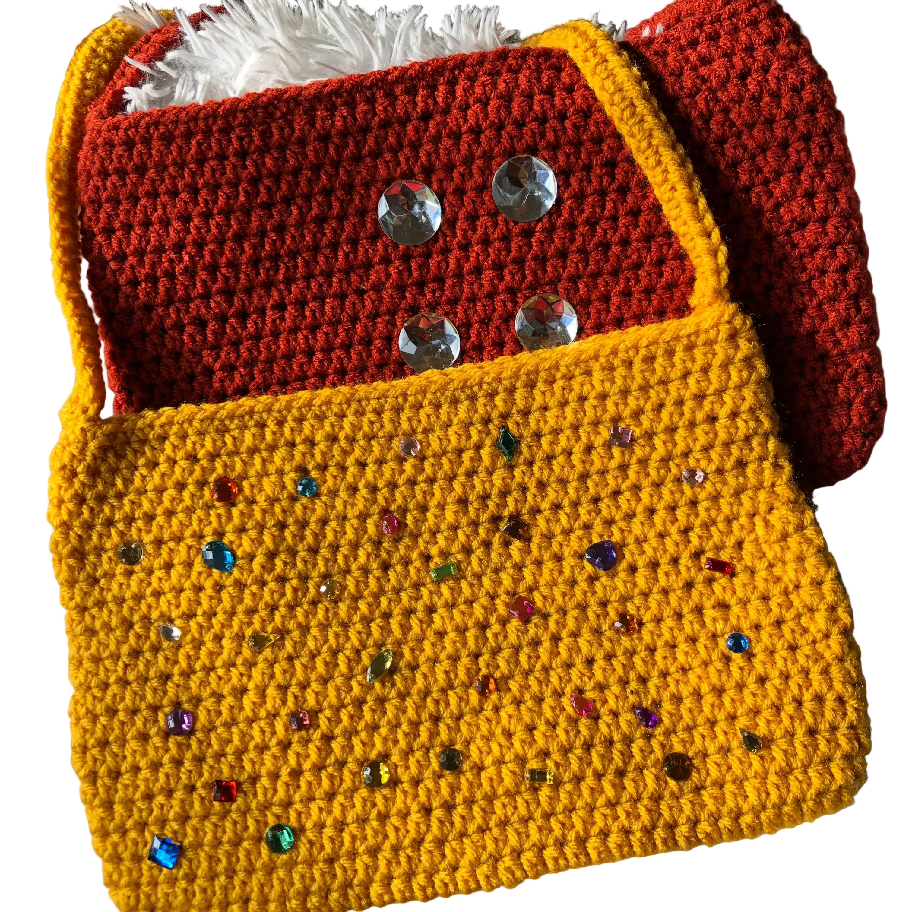 Crocheted pouch with colorful beads on a fluffy white surface